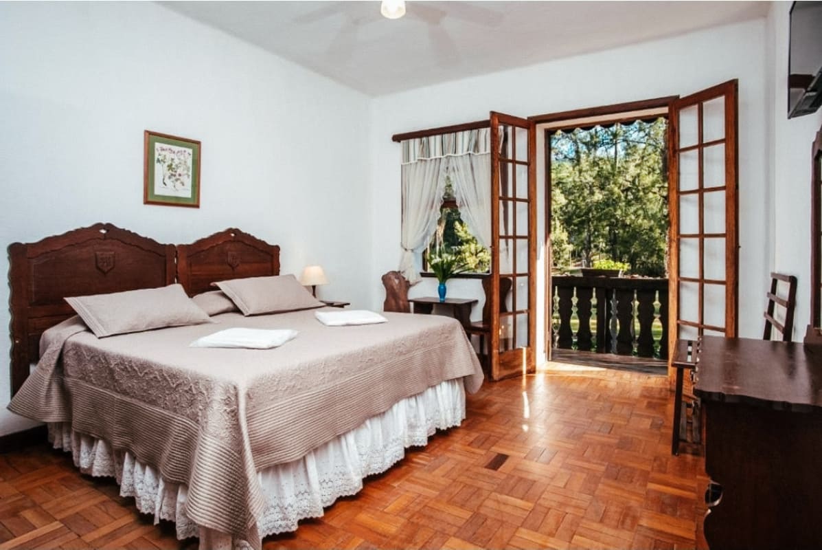 Melhores hotéis fazenda no RJ. Quarto no hotel fazenda São Moritz.