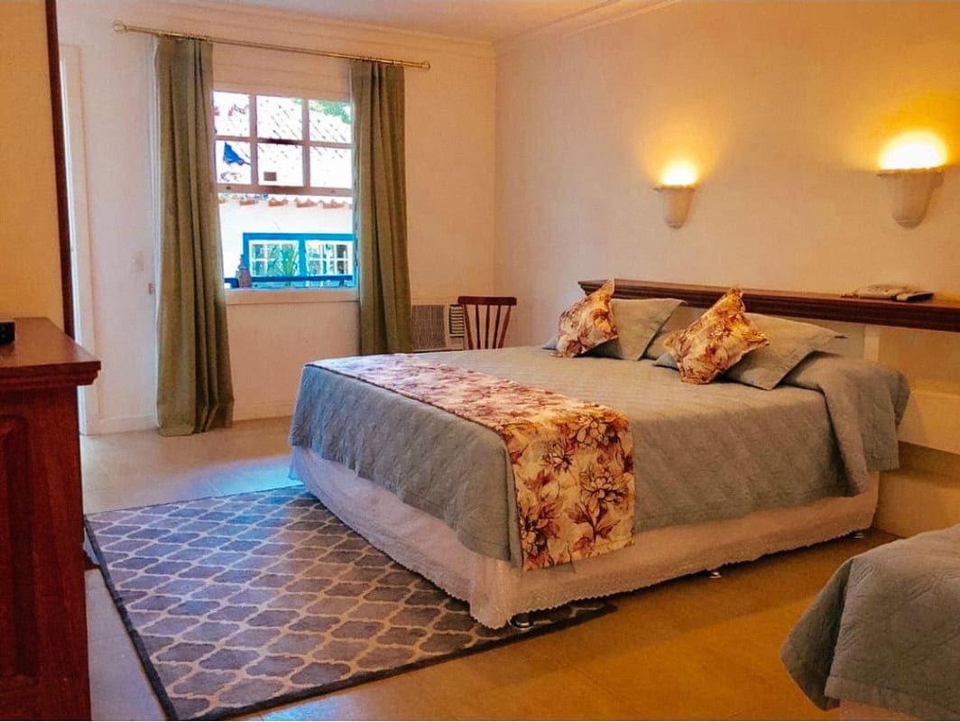 Melhores hotéis fazenda no RJ. Quarto do hotel fazenda Florença.